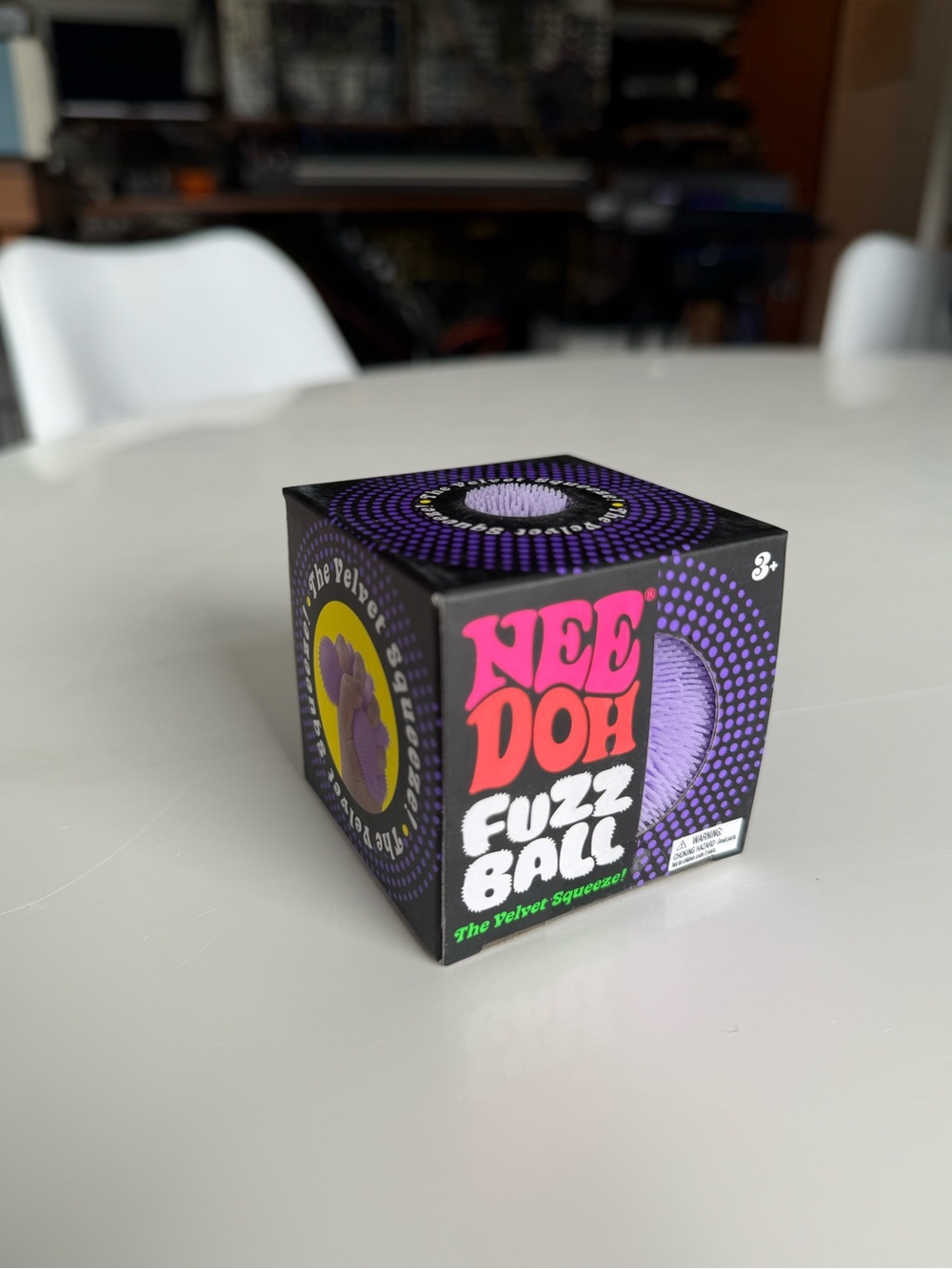 Brand new Needoh fuzz ball. Purple.